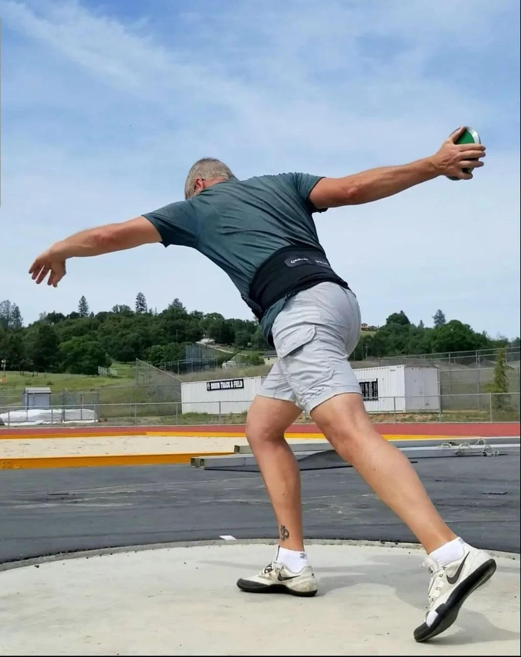 The Track & Field Coach Who Knows The Right Mix Of Business And Party